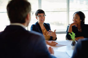 People sitting in conference room